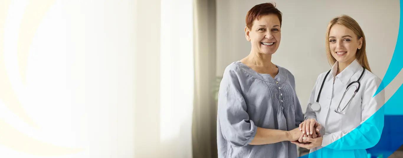 Two smiling healthcare professionals